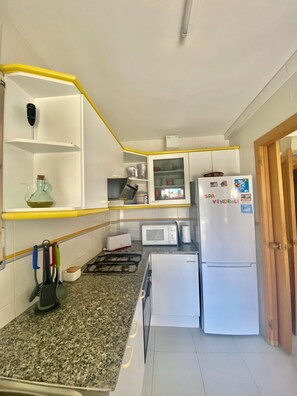 Private kitchen - Beautiful And Bright Apartment In Calafell, (El Vendrell)