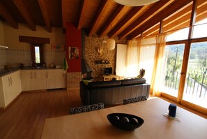 Apartment, 2 Bedrooms, Smoking, Fireplace | Dining - Casa Rural Mas Prat en Santa Margarita de Bianya (La Vall de Bianya)