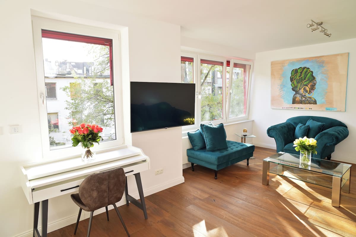 Luxe appartement | Woonruimte | Een televisie