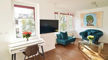 Luxe appartement | Woonruimte | Een televisie