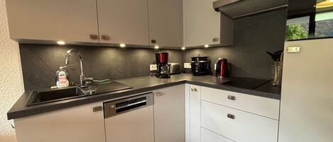 Fridge, microwave, dishwasher, high chair