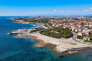 An aerial view of a coastal city with a marina, a beach, and residential buildings. - Ardenza s Aires 600 Mt From Sea (Livorno)