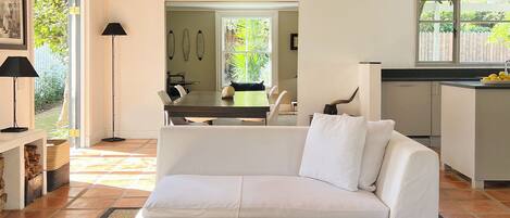 Standard House, Garden View | Living area | Flat-screen TV