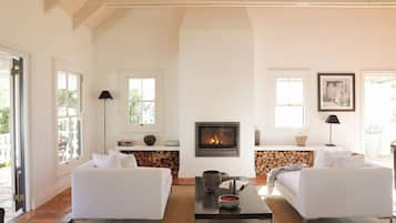 Standard House, Garden View | Living area | Flat-screen TV