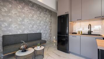 Deluxe Apartment, 2 Bedrooms, Beachside | Living area | Flat-screen TV