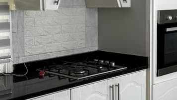 Family Apartment, 2 Bedrooms, Private Bathroom, Garden View | Private kitchen | Oven, stovetop, toaster, blender