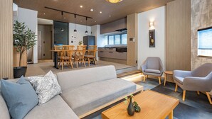 Deluxe Villa | Living area | 65-inch flat-screen TV with digital channels - JAPAVISTA Yamato (Osaka)