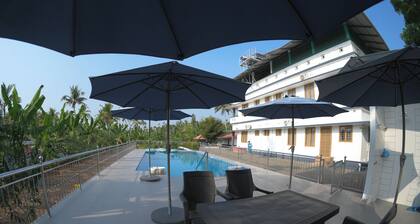 BIKI’S PALM VILLA.
Our motto is serve with a smile