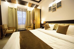 ห้องพรีเมียมดับเบิล, วิวเมือง | เครื่องนอนระดับพรีเมียม, เตียงพร้อมฟูกเสริมที่นอน