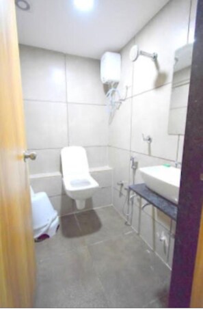 Shower, rainfall showerhead, towels, soap