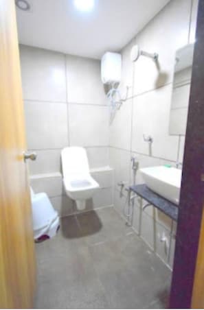 Shower, rainfall showerhead, towels, soap