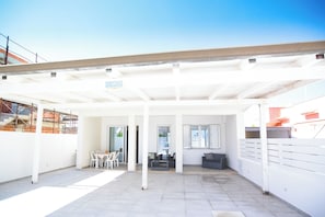 Outdoor dining - homidoo Marza Apartment (Marzamemi)
