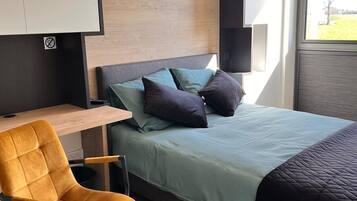 Comfort eenpersoonskamer, 1 tweepersoonsbed, uitzicht op tuin | Een bureau, verduisterende gordijnen, gratis wifi