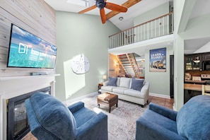 Signature Condo, 2 Bedrooms, Balcony, Garden View | Living room | 55-inch flat-screen TV with cable channels, fireplace, DVD player