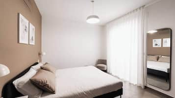 1 slaapkamer, een strijkplank/strijkijzer, wifi, beddengoed