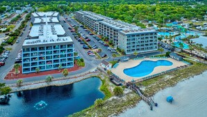 A resort with multiple buildings, a swimming pool, and a marina. - T1012 at Myrtle Beach Resort (Myrtle Beach)