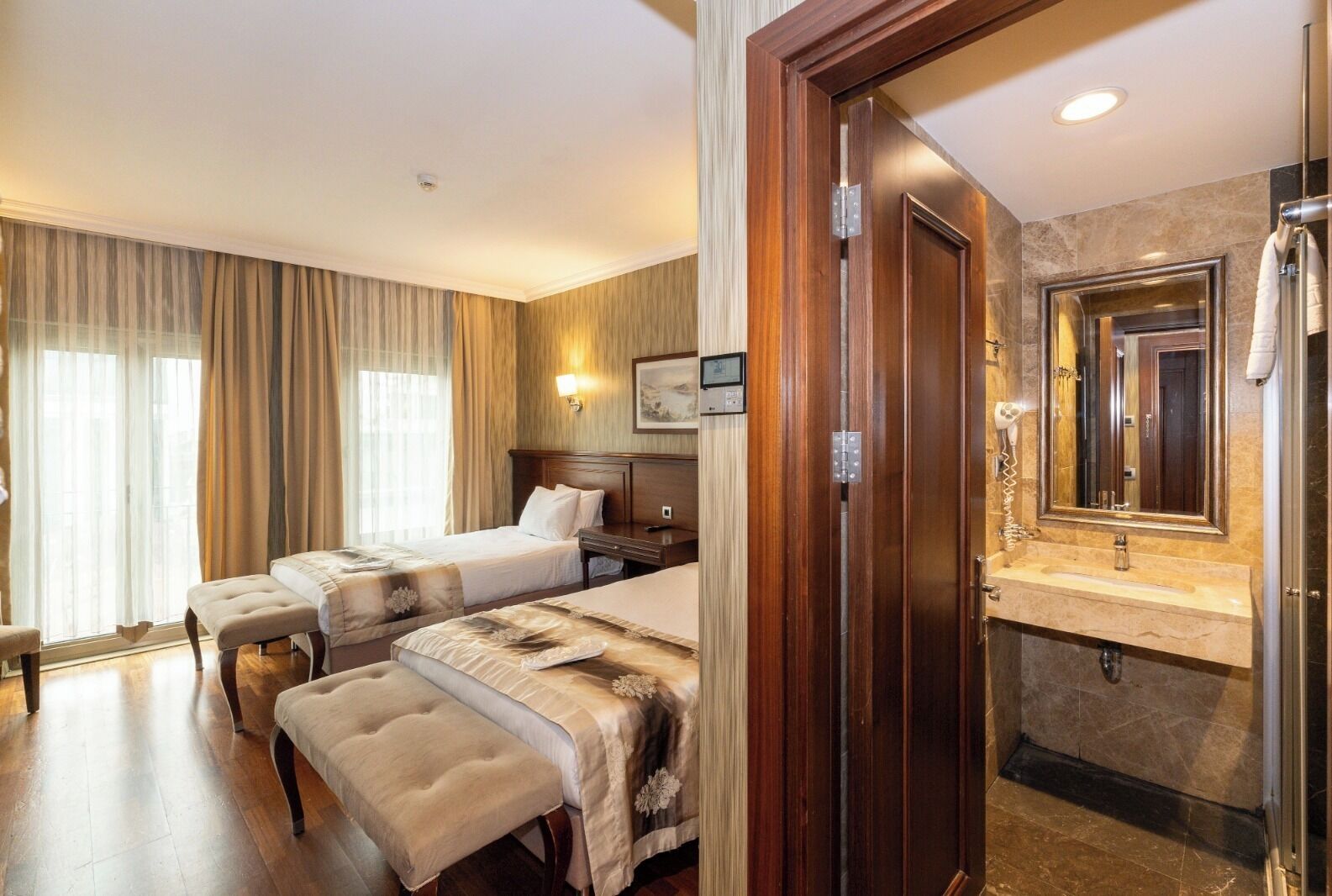 Standard Twin Room, City View | Laptop workspace, iron/ironing board, free WiFi