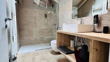 Hair dryer, bidet, towels, soap