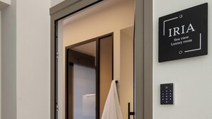 A hotel room entrance with a sign indicating 'IRIA Sea view Luxury room'. - Iria Sea View Room (Platanias)