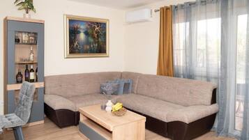 Villa (Five Bedroom Villa With Pool) | Living room | 32-inch flat-screen TV with cable channels