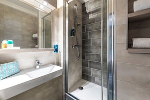 Hair dryer, towels, soap, shampoo