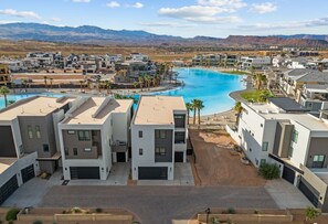 Residents enjoy a tranquil atmosphere with a large swimming pool and mountain views.