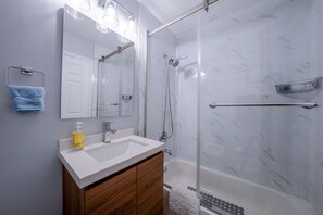 Hair dryer, towels, soap, shampoo