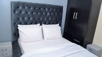 2 habitaciones, tabla de planchar con plancha, wifi y ropa de cama