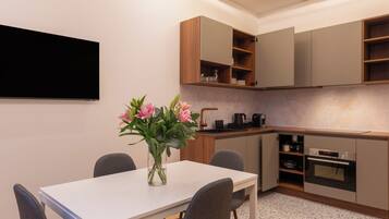 Family Apartment | Private kitchen | Fridge, microwave, oven, espresso maker