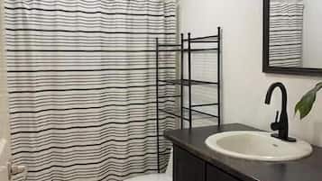 Hair dryer, towels, soap, toilet paper