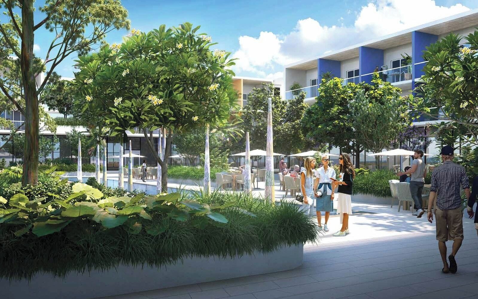 An outdoor area with a pool, seating, and a modern building with blue and white colors.