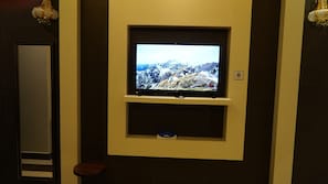 In-room safe, desk, laptop workspace, iron/ironing board - Dana Hotel Suites (Riyadh)