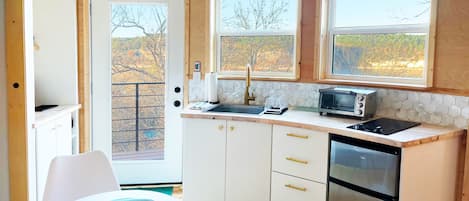 Fridge, microwave, stovetop, coffee/tea maker