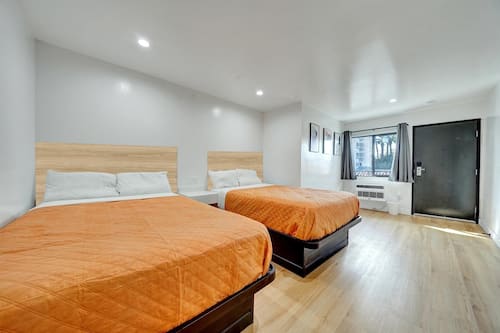 Habitación triple Deluxe | Escritorio, espacio para trabajar con laptop y wifi gratis