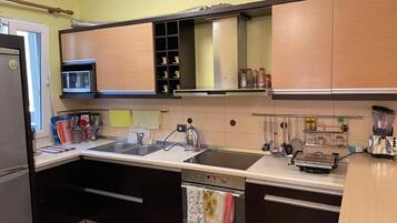 Villa | Private kitchen | Fridge, microwave, oven, stovetop