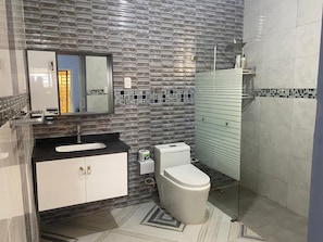 Shower, towels, soap, shampoo