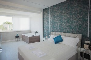 JUNIOR SUITE MEDITERRANEO 103 | In-room safe, individually furnished, blackout drapes, soundproofing