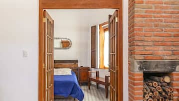 1 bedroom, desk, iron/ironing board, travel crib