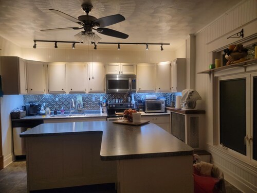 2 large private rooms available in a large home.