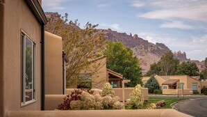 A building with a view of a mountain range. - Slickrock Sanctuary (Moab)