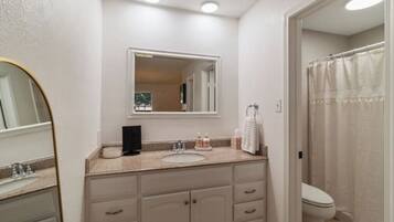 Hair dryer, towels, soap, toilet paper