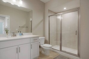 Hair dryer, towels, soap, shampoo