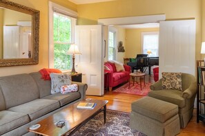 TV, fireplace, books, printers