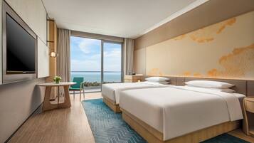 Habitación Premium, 2 camas dobles, balcón, frente al mar | Ropa de cama de alta calidad, edredones de plumas, minibar y caja fuerte