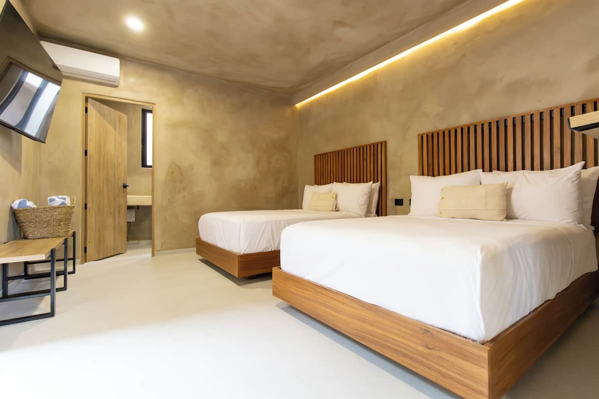 Suite familiare | 1 camera, una cassaforte in camera, Wi-Fi gratuito, lenzuola