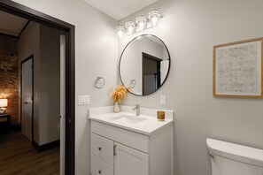 Shower, towels, soap, toilet paper