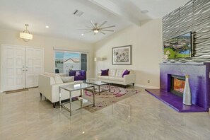 Smart TV, fireplace, books