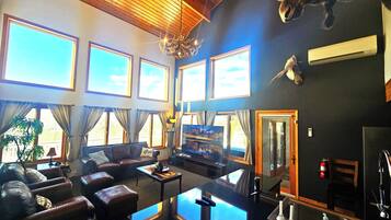 60-inch Smart TV with digital channels, video-game console, Netflix