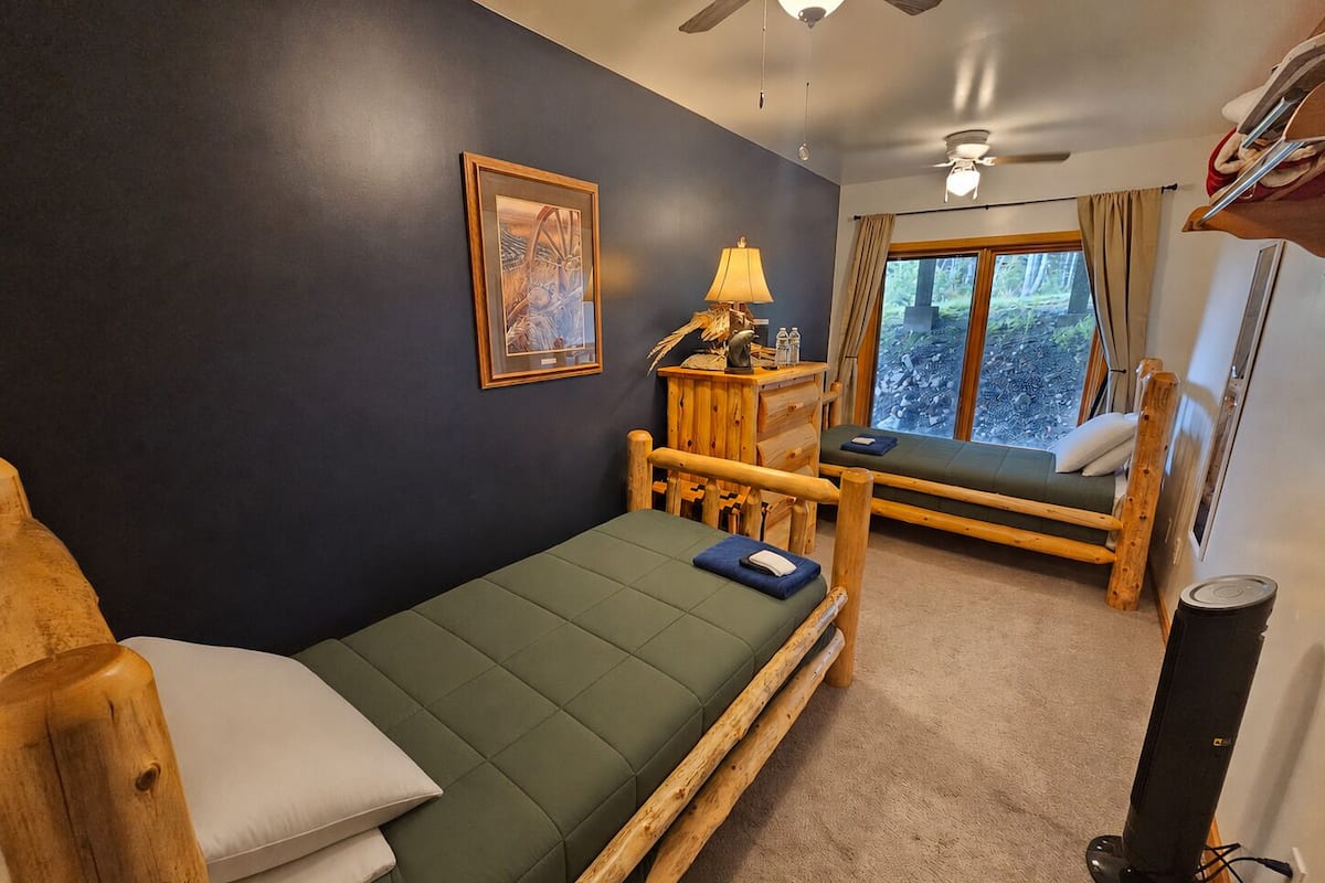 Premium bedding, memory foam beds, laptop workspace, iron/ironing board