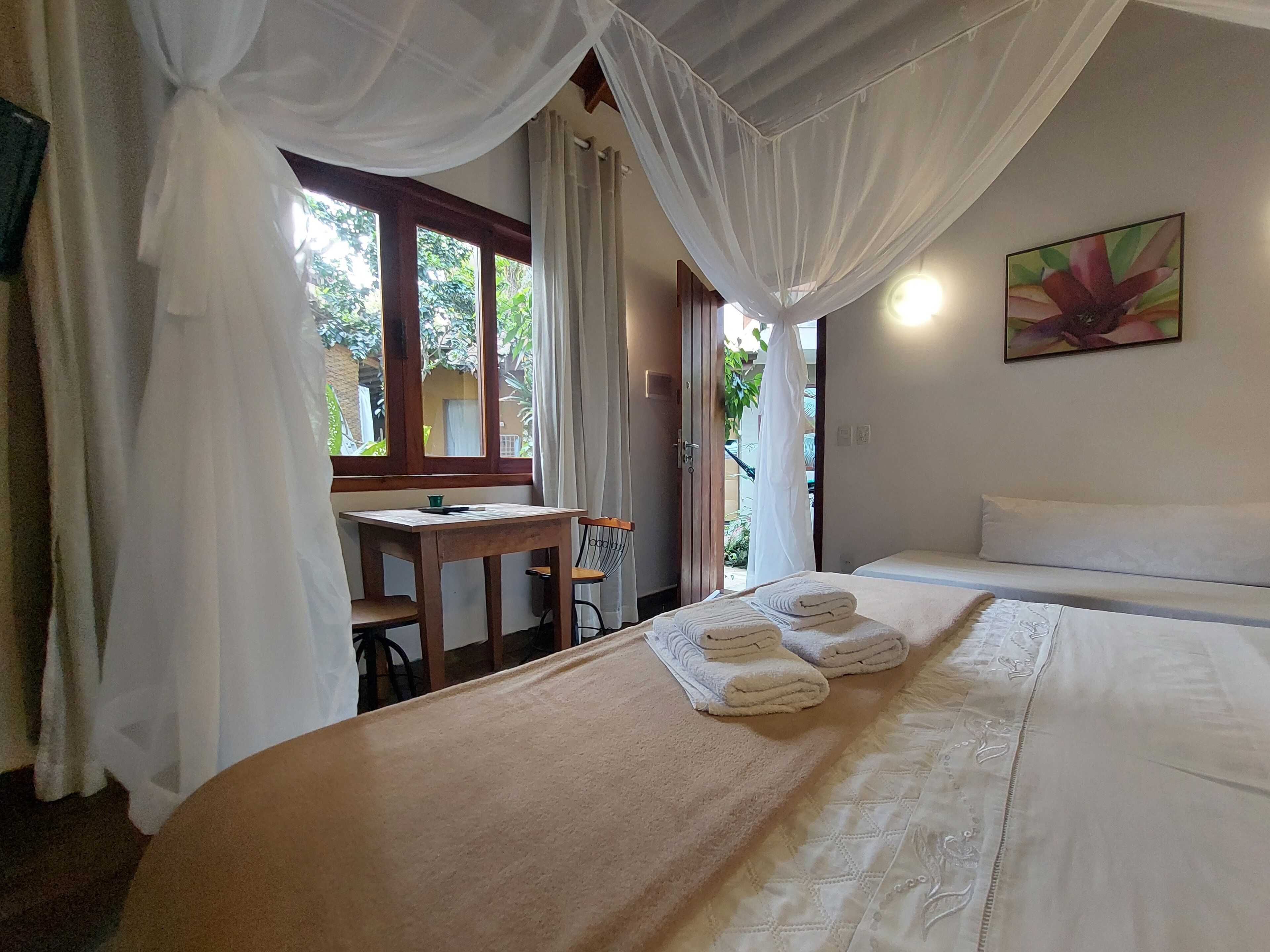 Suíte econômica, 1 cama Queen, para não fumantes, ar-condicionado | Wi-Fi de cortesia, roupa de cama